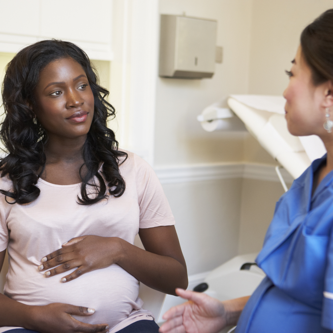 Black mom talks to health provider.